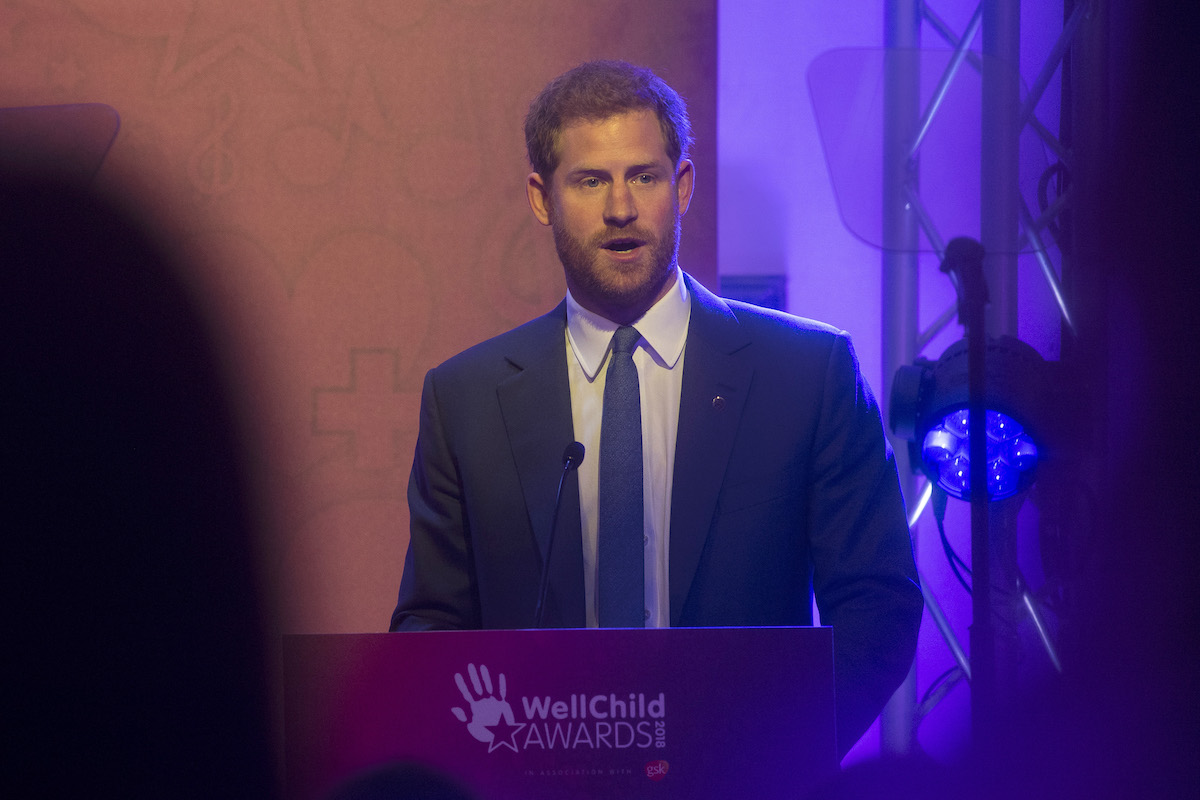 Prince Harry, who appeared in a 2023 WellChild Awards video to copy Kate Middleton, stands at a lectern.