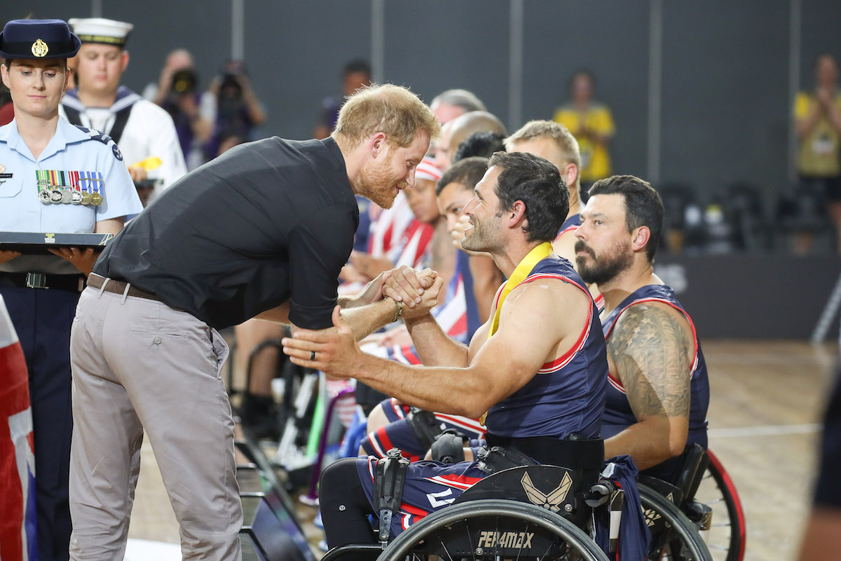 Prince Harry shakes hands with an Invictus Games competitor