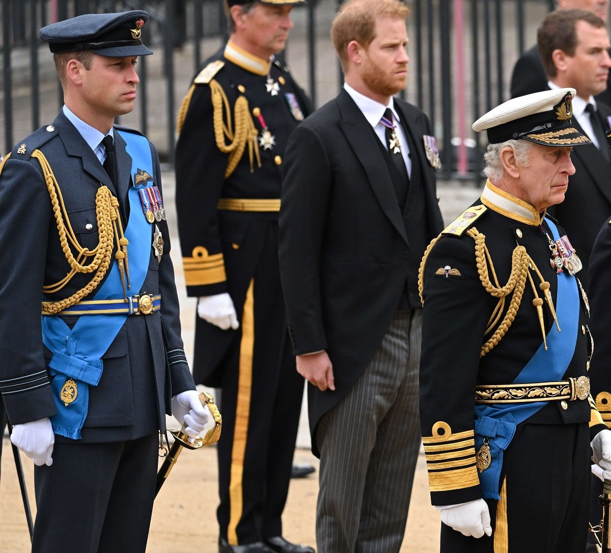 Prince William, Prince Harry, and King Charles III during the state funeral procession of Queen Elizabeth II at Westminster Abbey