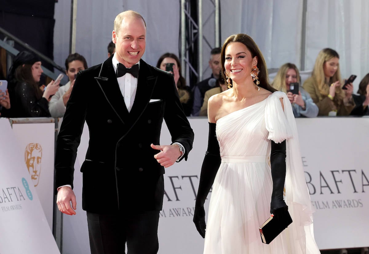 Kate Middleton, whose black gloves were praised a stylist and royal fashion expert, arrives at the 2023 BAFTAs with Prince William