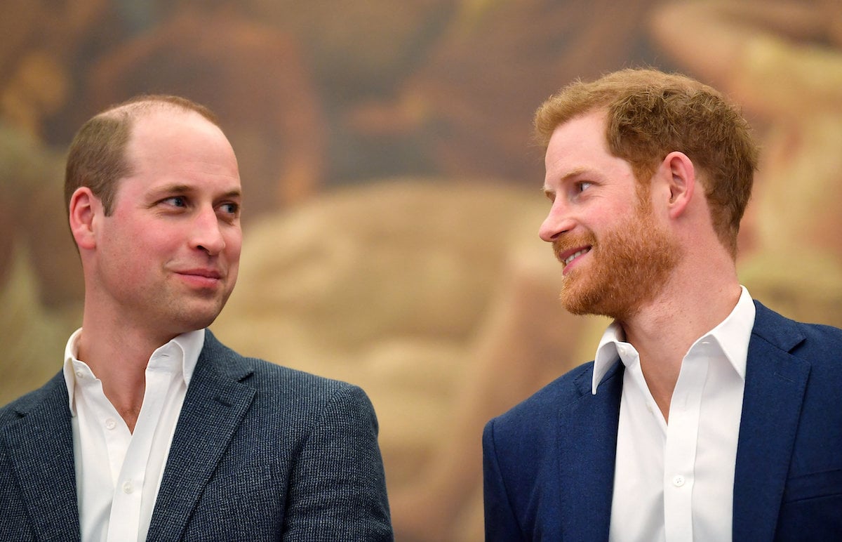 Prince William and Prince Harry, who used to go to Harrods to play video games, look at each other