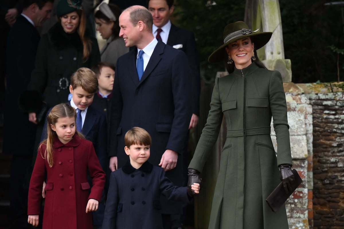 Prince William and Kate Middleton, who don't want to move to Windsor Castle, per an expert, walk with Prince George, Princess Charlotte, and Prince Louis