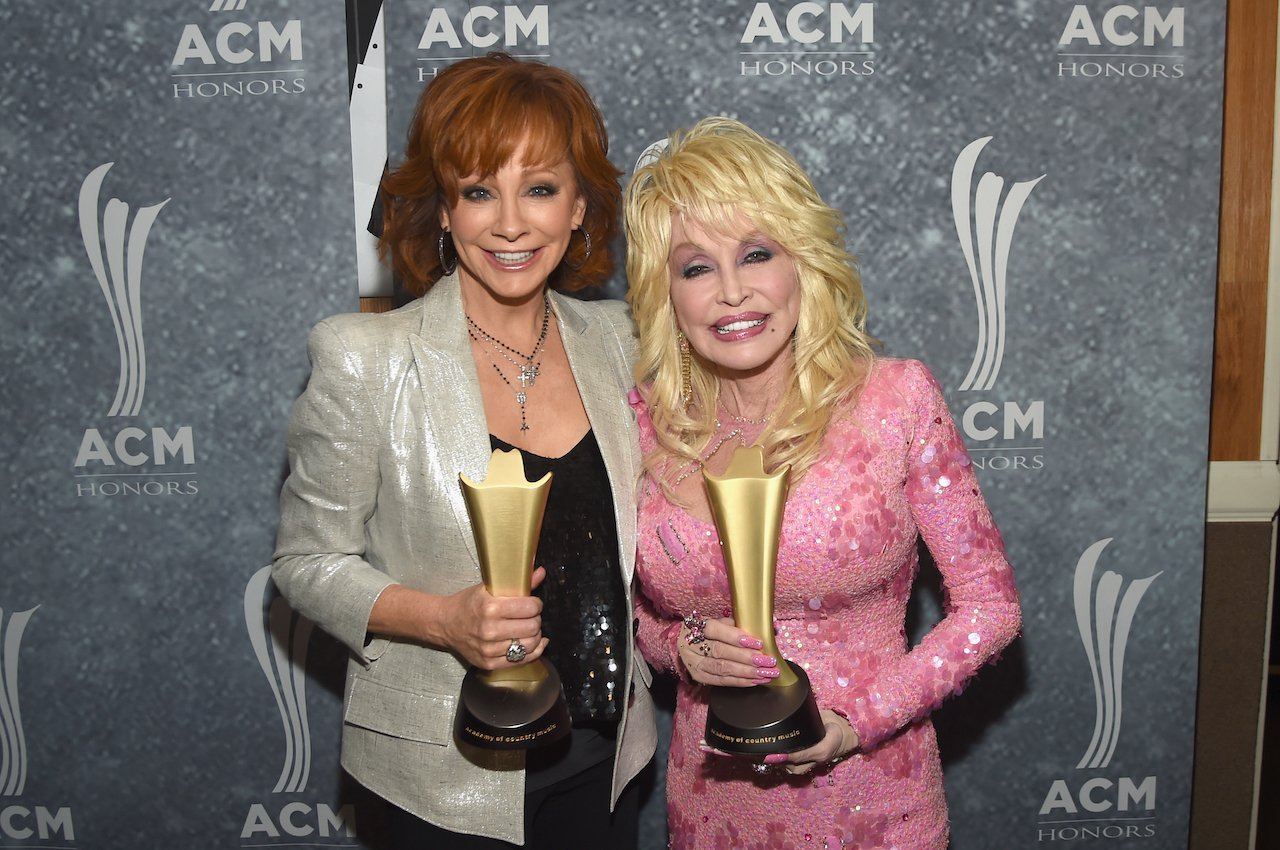 Reba McEntire and Dolly Parton attend the 11th Annual ACM Honors at the Ryman Auditorium on August 23, 2017, in Nashville, Tennessee.