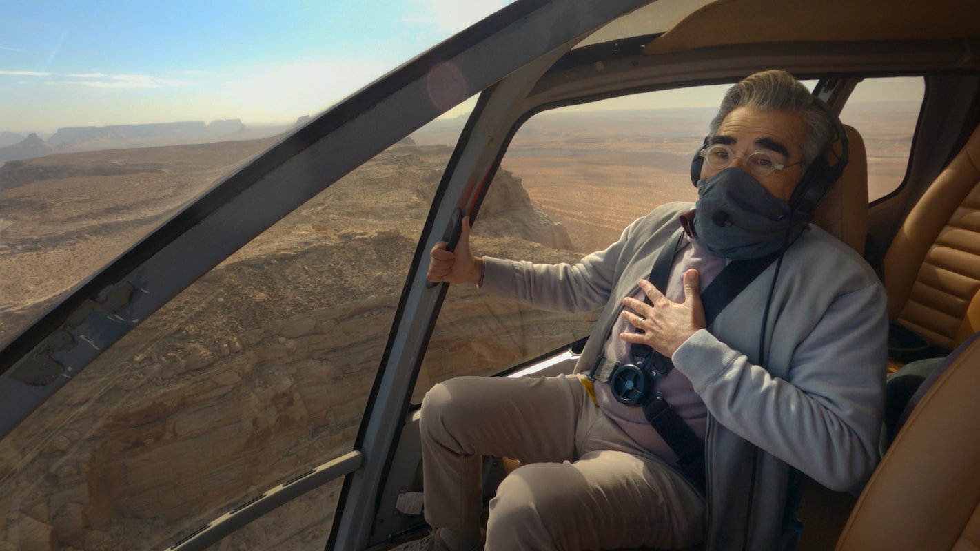 'The Reluctant Traveler': Eugene Levy rides in a helicopter