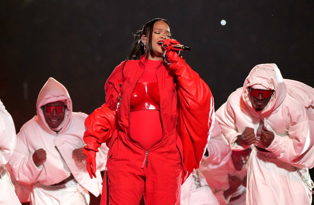 Rihanna performs and reveals her pregnancy at the 2023 Super Bowl.