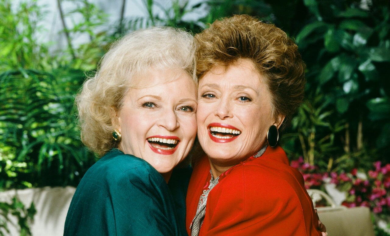 (l-r) Betty White as Rose Nylund, and Rue McClanahan as Blanche Devereaux on 'The Golden Girls.'