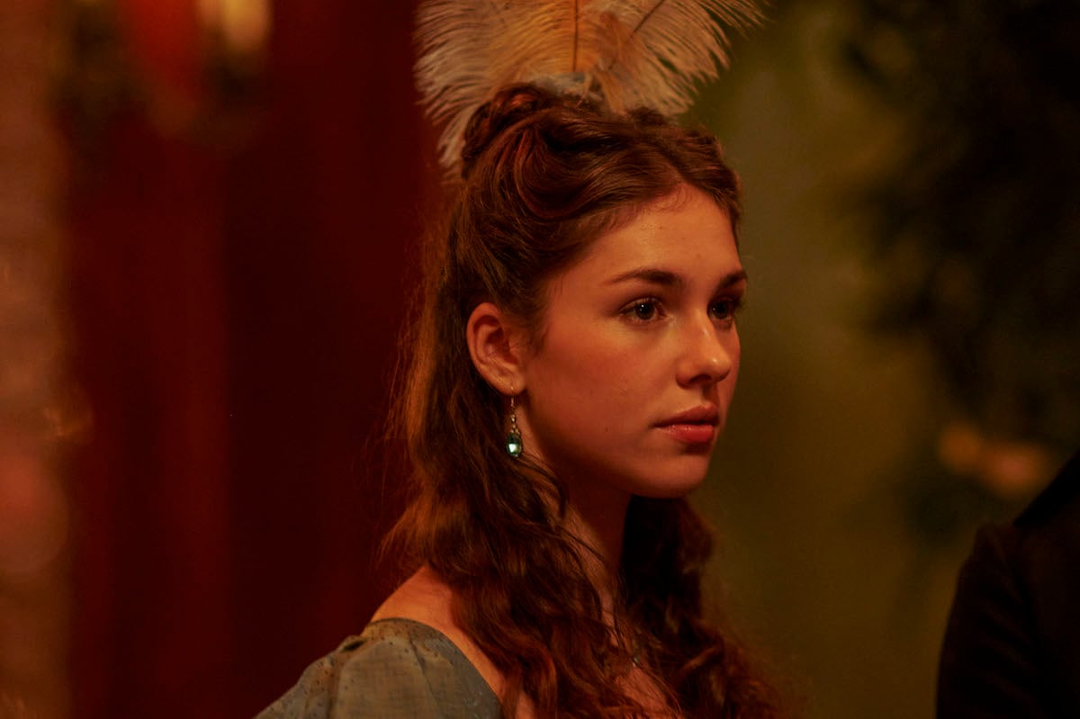 Augusta with a feather in her hair in 'Sanditon' Season 3