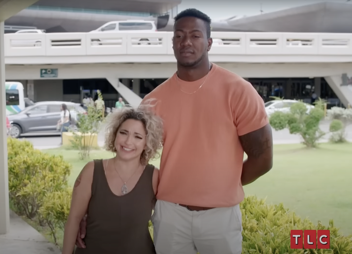 Daniele and Yohan film a scene after she arrives at the airport in the Dominican Republic