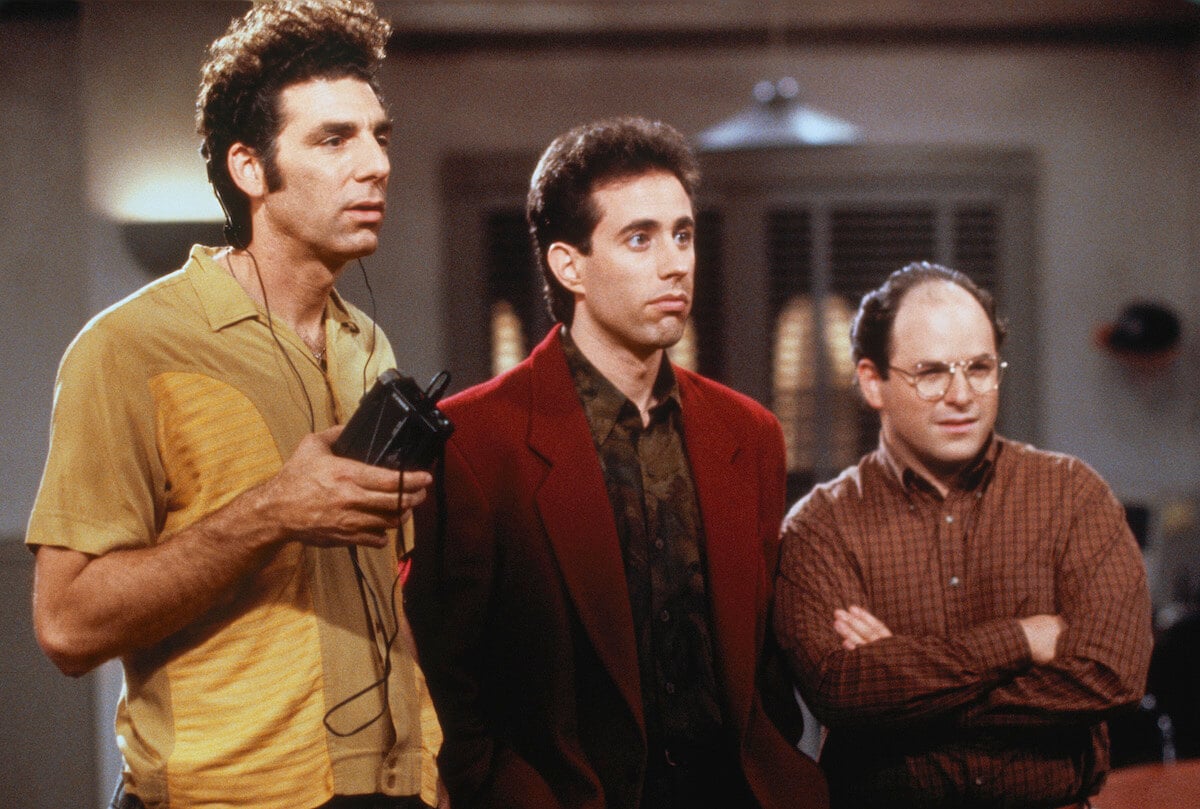 'Seinfeld': Jason Alexander folds his arms standing beside Michael Richards and Jerry Seinfeld