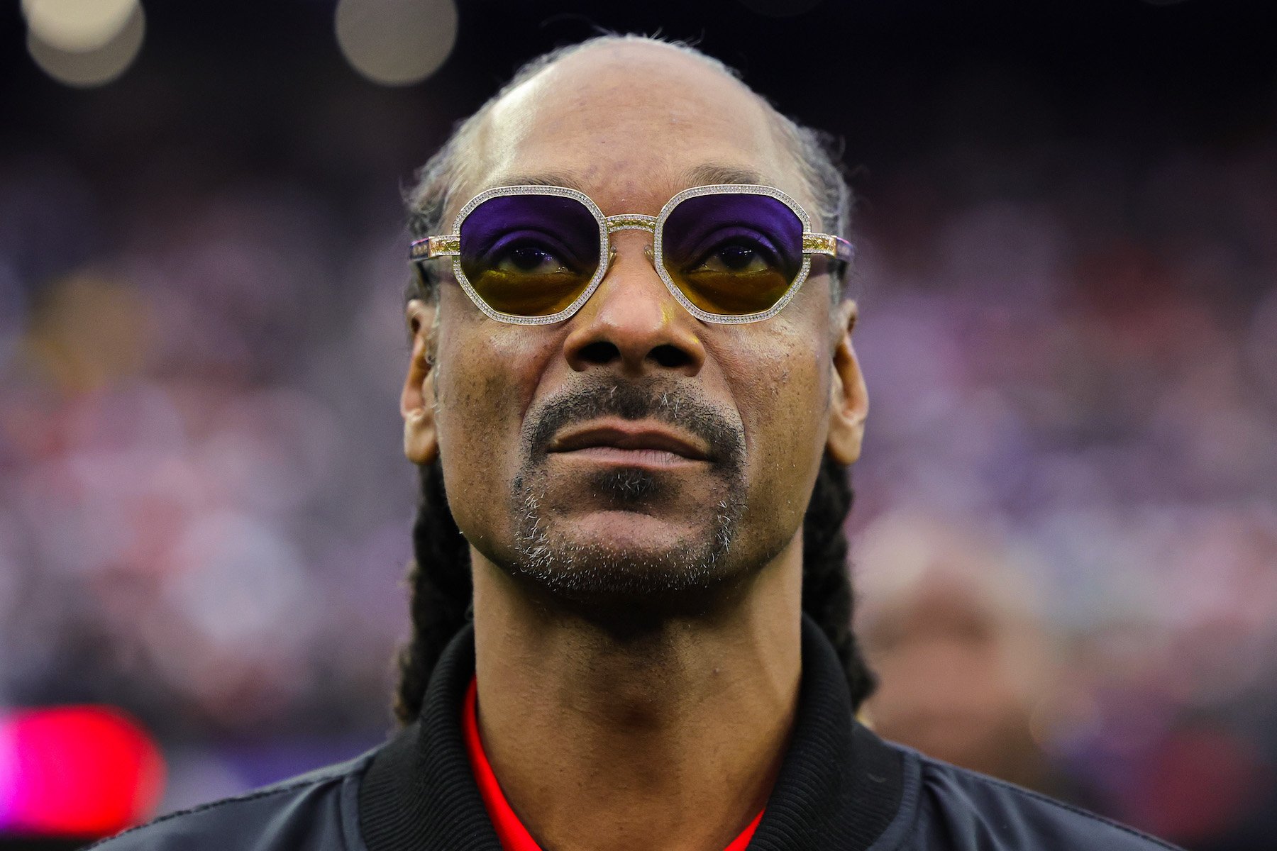 Snoop Dogg, who has yet to be honored by the Grammys, wearing sunglasses