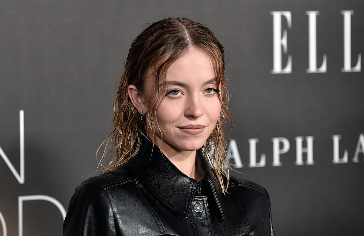 Sydney Sweeney wearing a black leather outfit