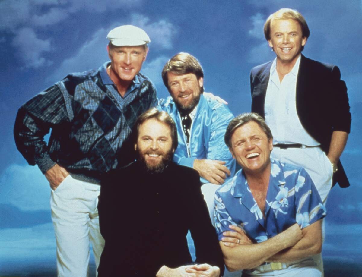 Mike Love, Carl Wilson, Brian Wilson, Bruce Johnston, and Al Jardine take a promotional photo as The Beach Boys in 1985