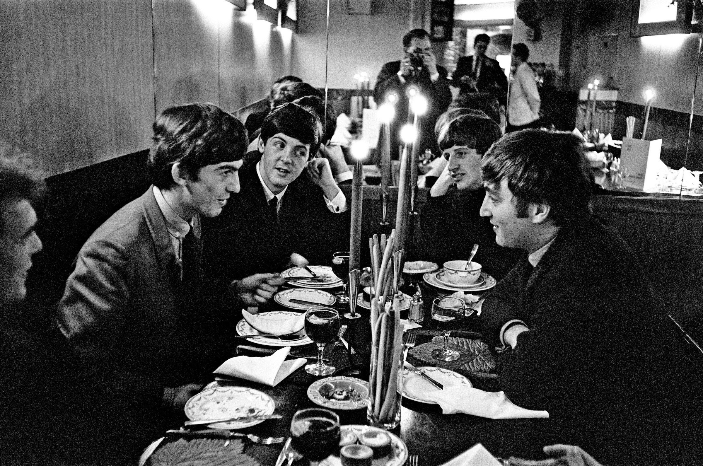 The Beatles, at lunch, London, (George Harrison, Paul McCartney, Ringo Starr, and John Lennon)