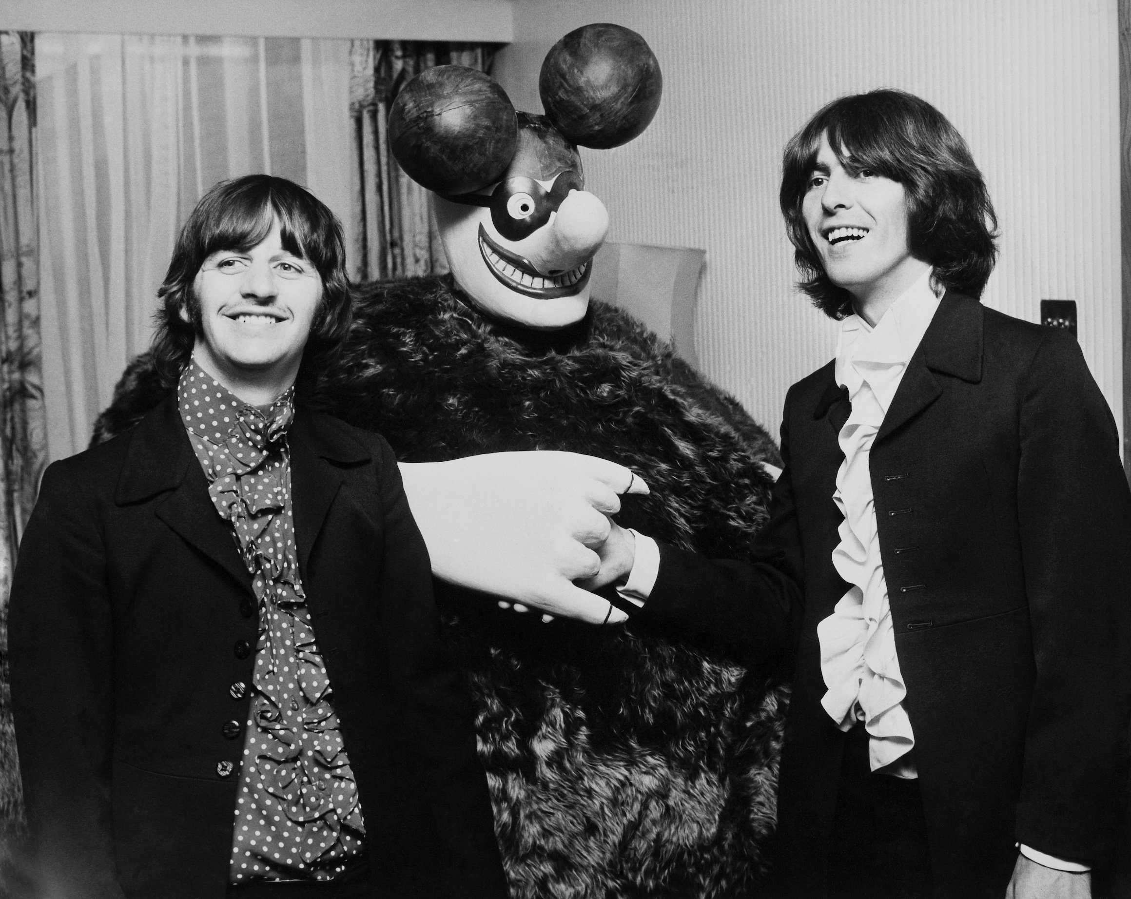 Ringo Starr and George Harrison of The Beatles attend a presentation of Yellow Submarine