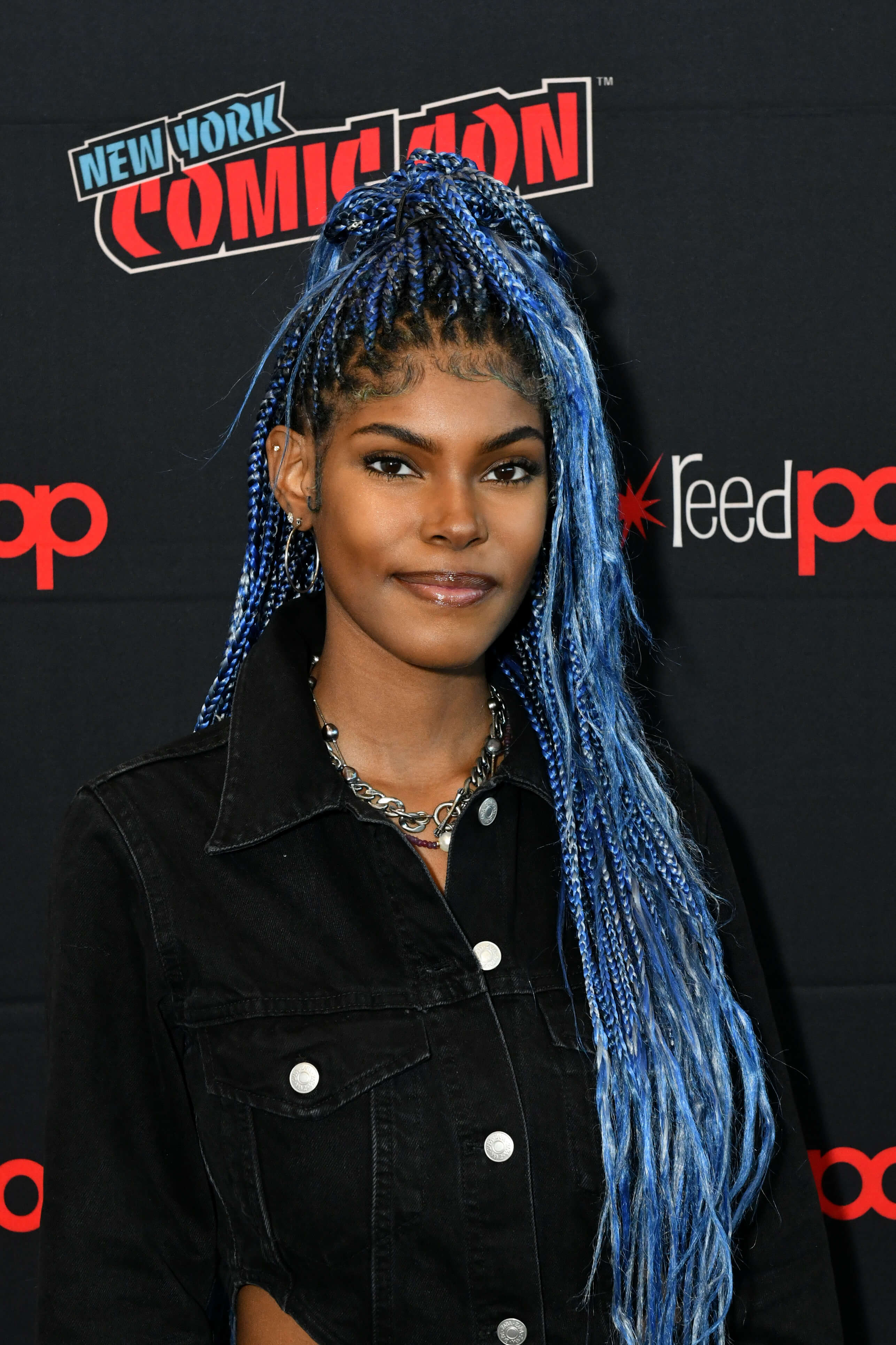 'The Bold and the Beautiful' star Diamond White dressed in a black outfit; posing on the red carpet.