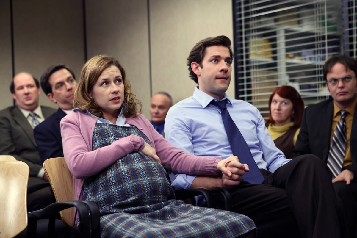 'The Office': Jim (John Krasinski) and a pregnant Pam (Jenna Fischer) sit in a meeting