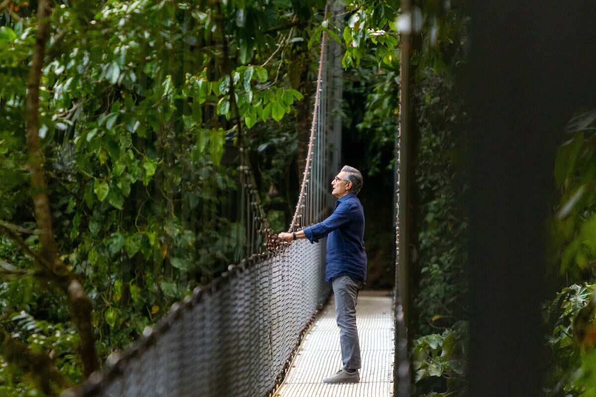'Reluctant Traveler': Eugene Levy stands on a bridge in Costa Rica