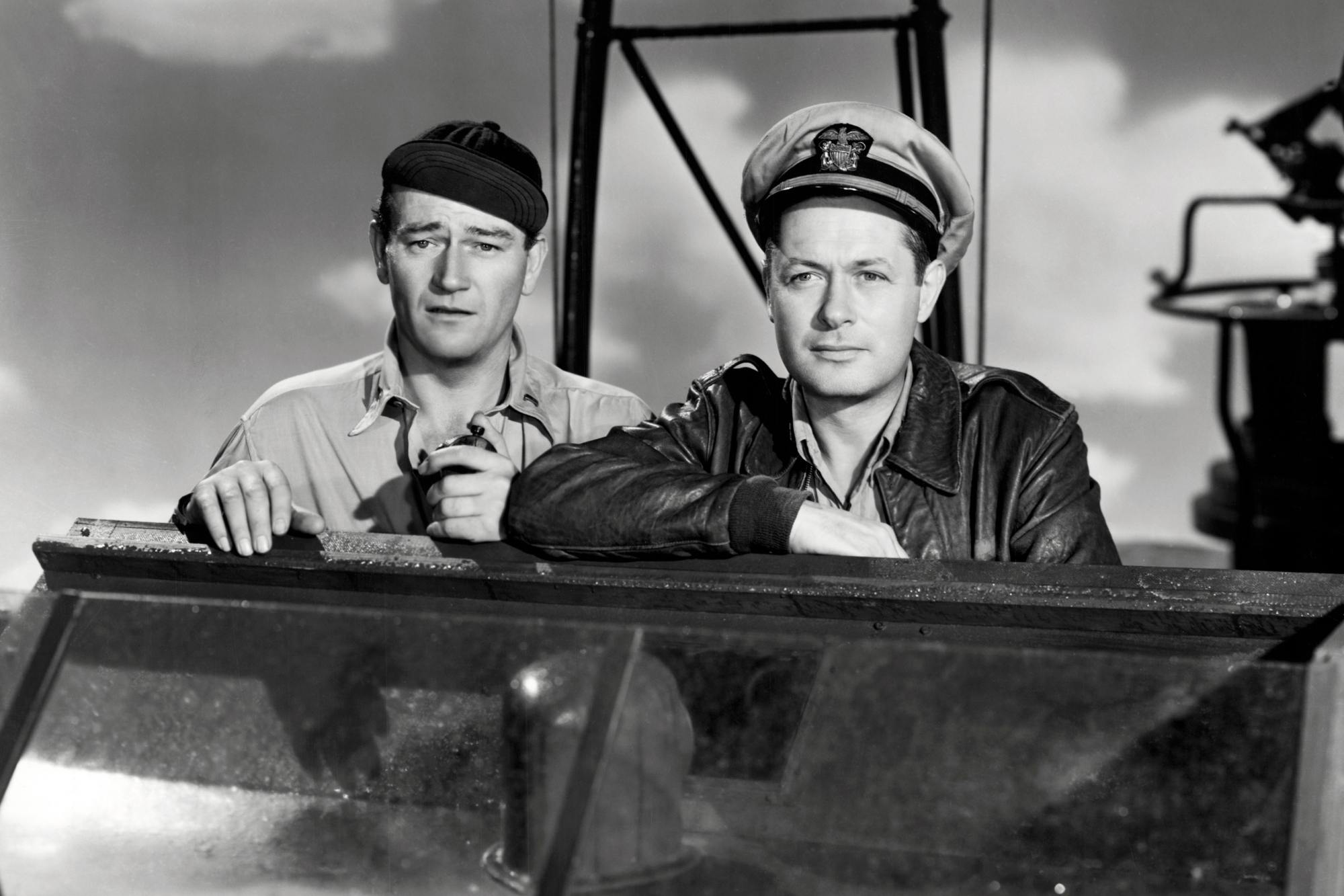 'They Were Expendable' John Wayne as Lt. Rusty Ryan and Robert Montgomery as Lt. John Brickley on a ship looking onward