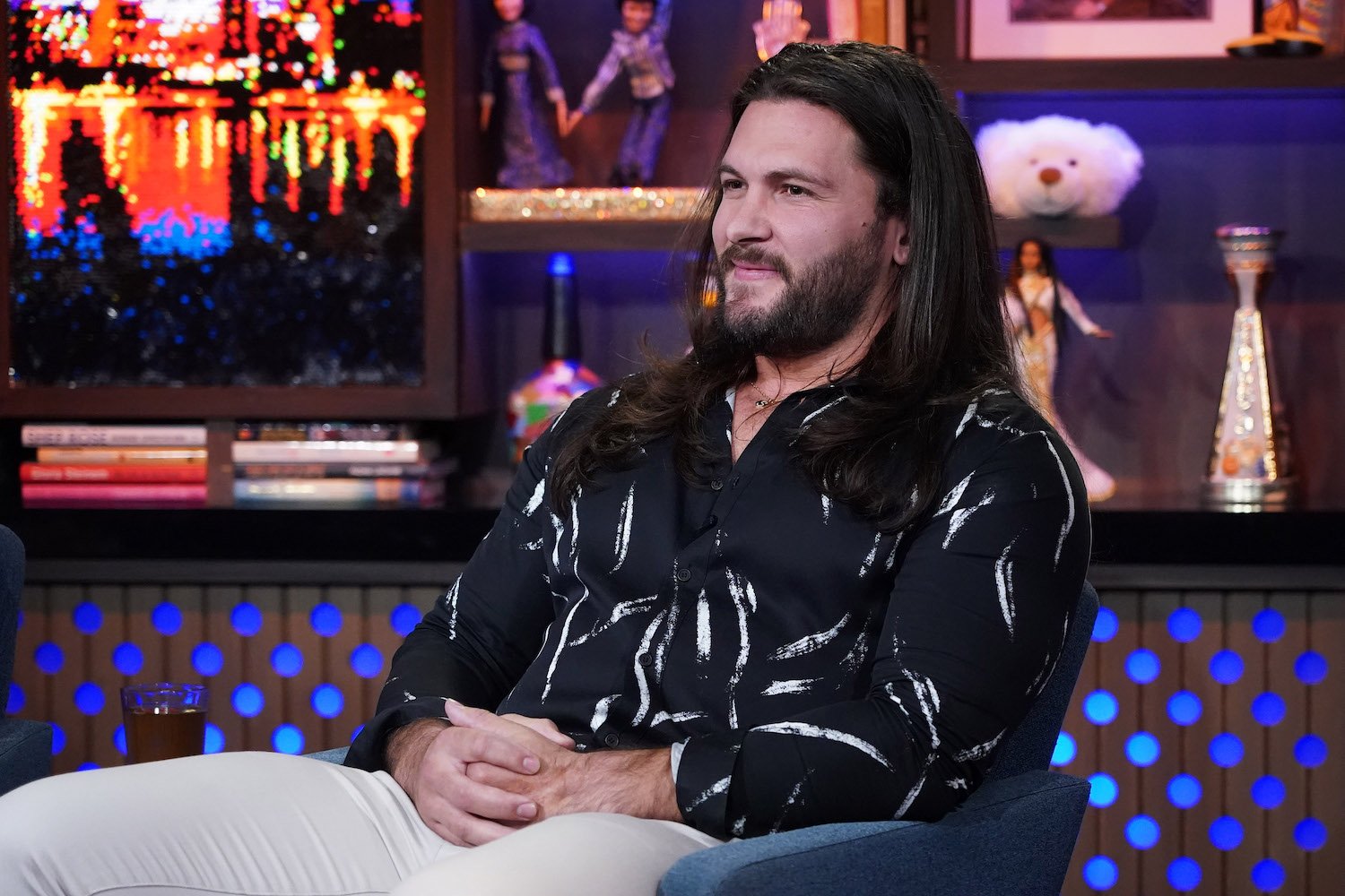 'Vanderpump Rules' star Brock Davies wearing a black and white button down on the set of 'Watch What Happens Live'