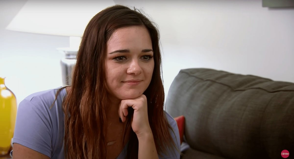 Virginia Coombs with her hand on her chin in an episode of Married at First Sight Season 12