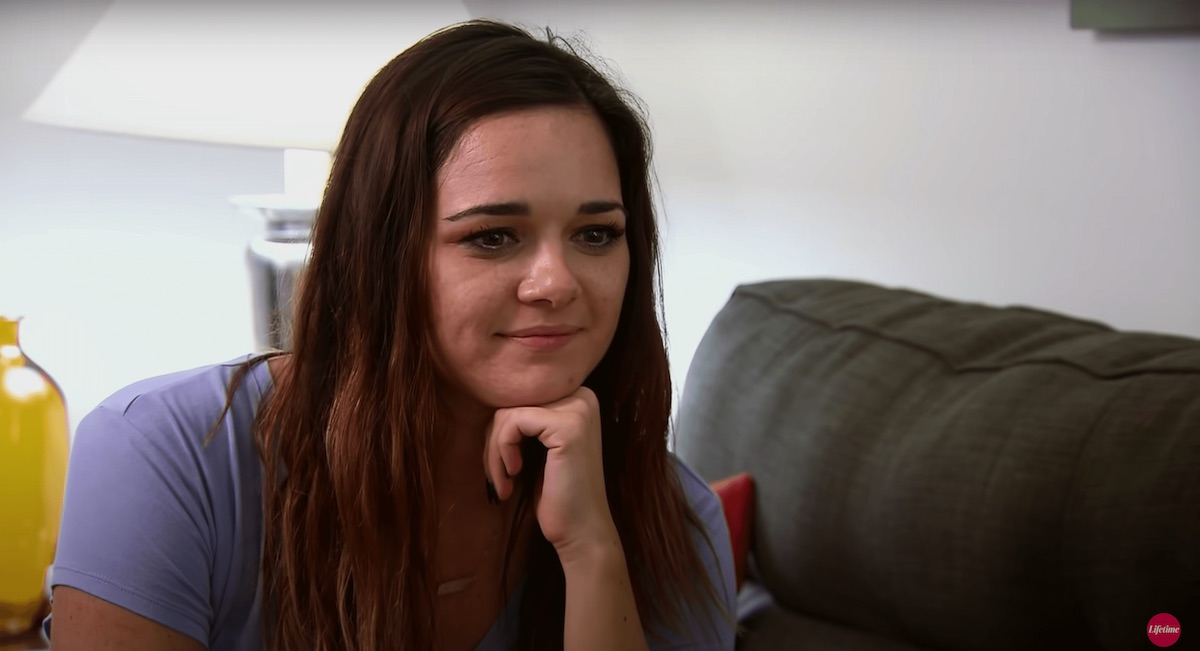 Virginia Coombs with her hand on her chin in an episode of Married at First Sight Season 12