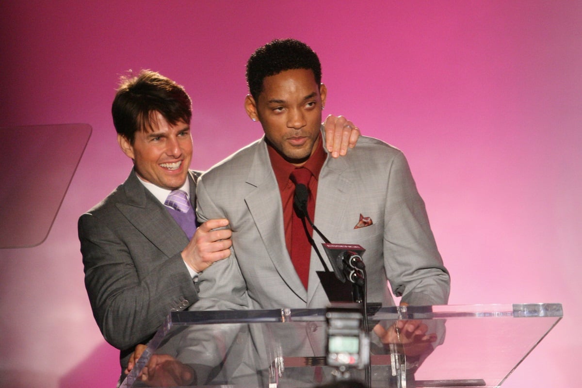 Will Smith and Tom Cruise on stage.