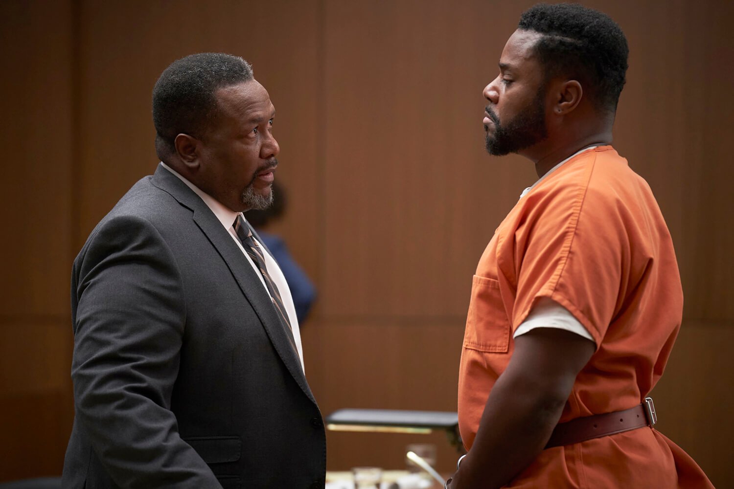Accused Episode 4 cast members Wendell Pierce as Detective Trent Douglas and Malcolm-Jamal Warner as Kendall facing each other in a courtroom.