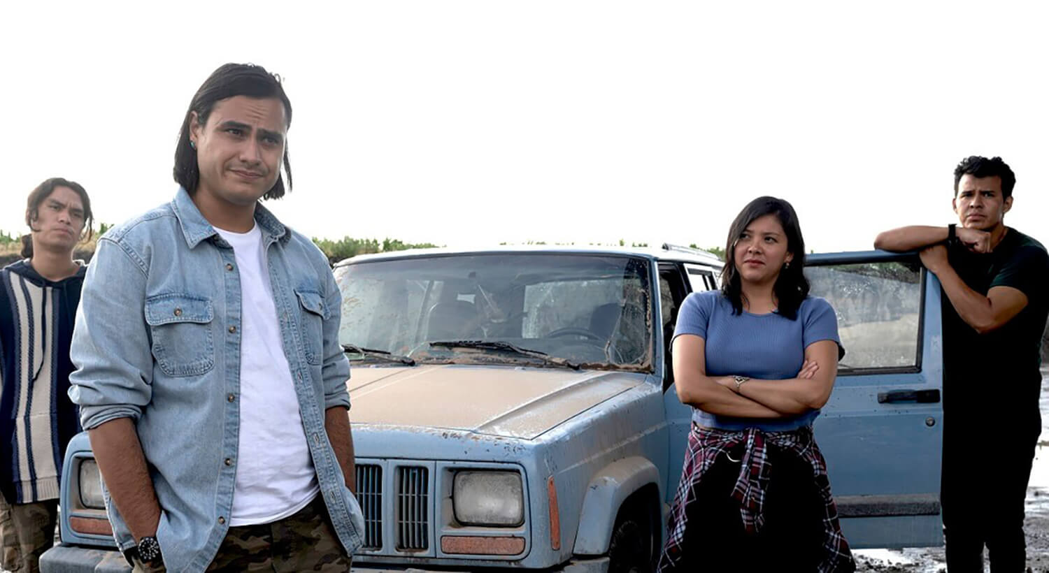 Accused Episode 6 cast members Forrest Goodluck, Kiowa Gordon, Natalie Benally and Robert Mesa standing around a car