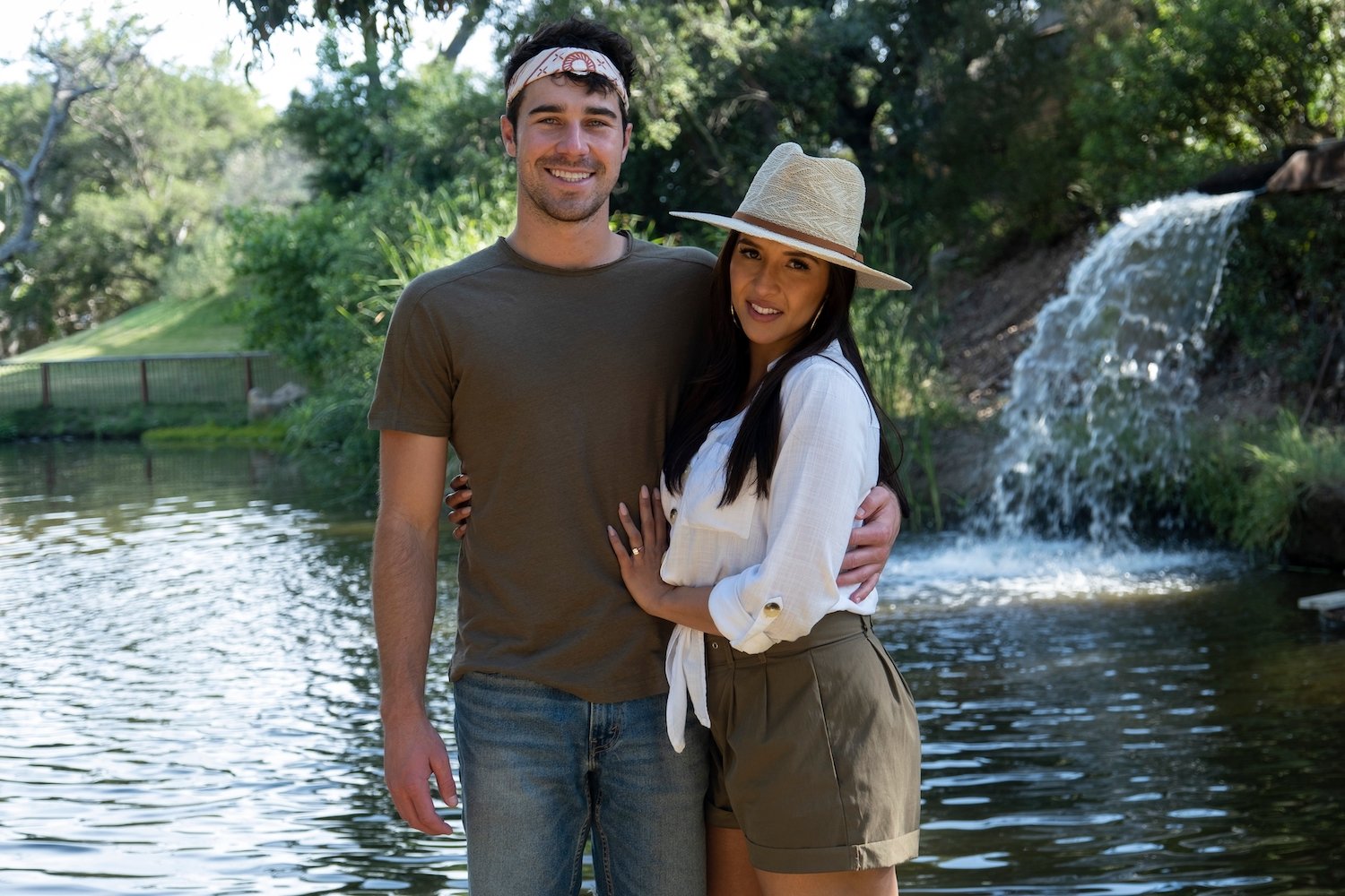 'Love Is Blind: After the Altar' stars Zanab and Cole pose in front of a pond in a production still from 'Love Is Blind' Season 3.