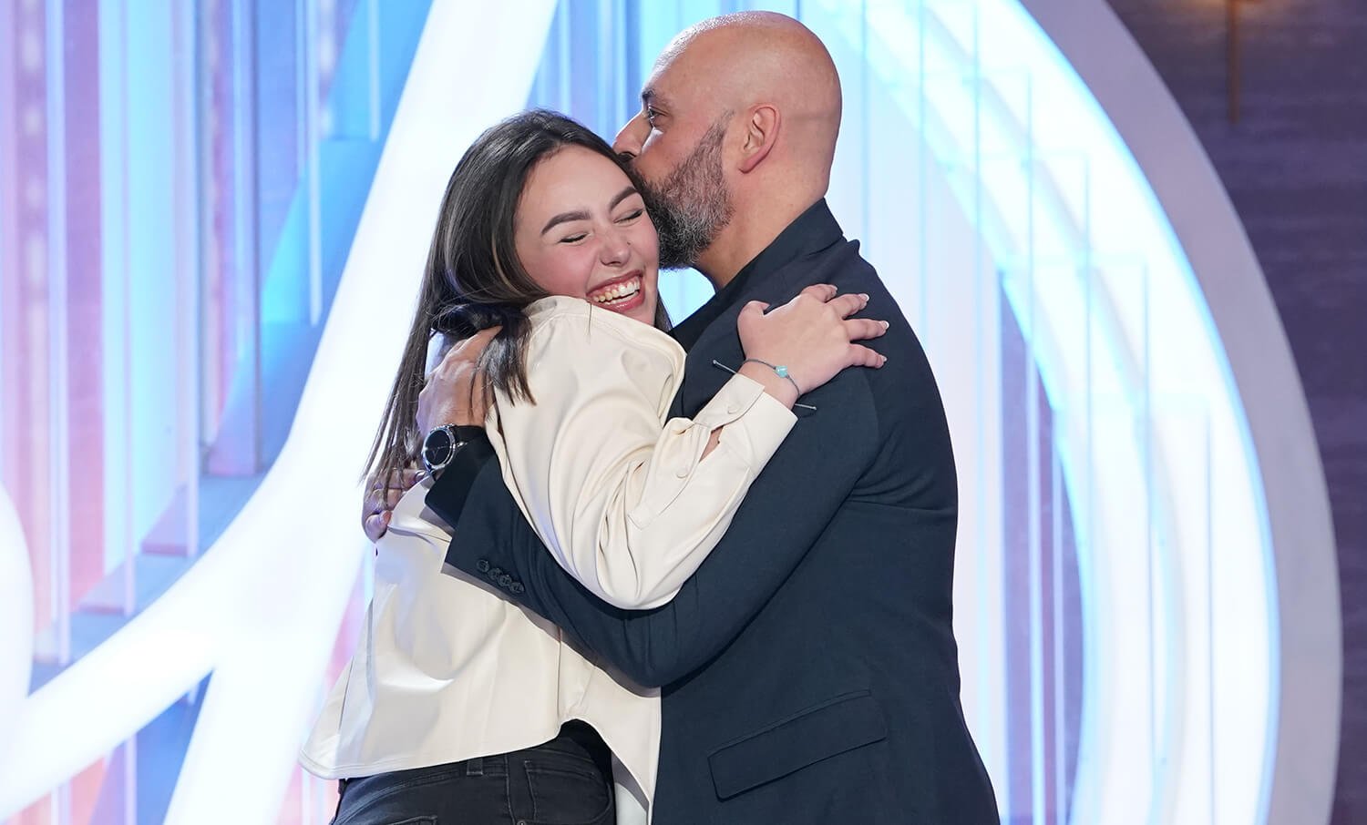 McKayla Stacey hugs her father, Phil Stacey, after getting into Hollywood on American Idol