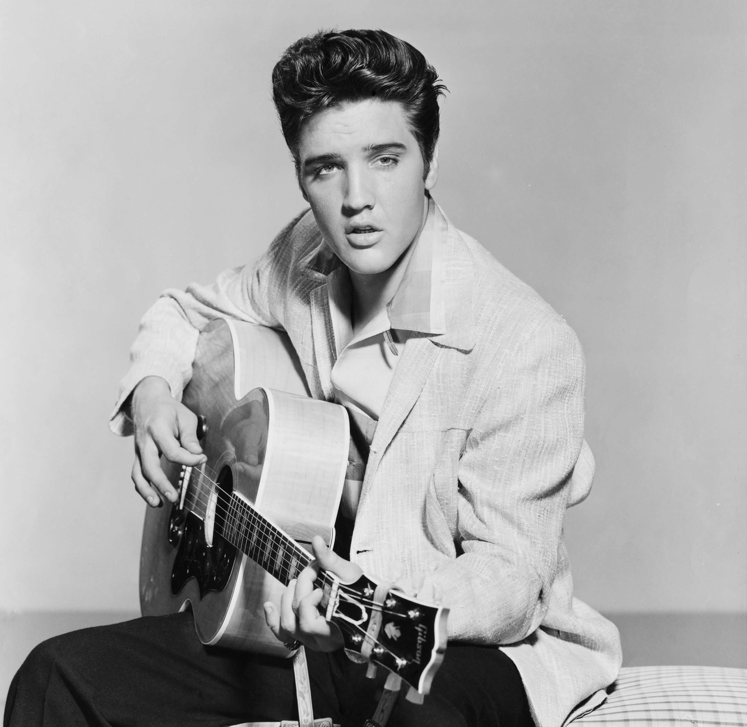 Elvis Presley with a guitar