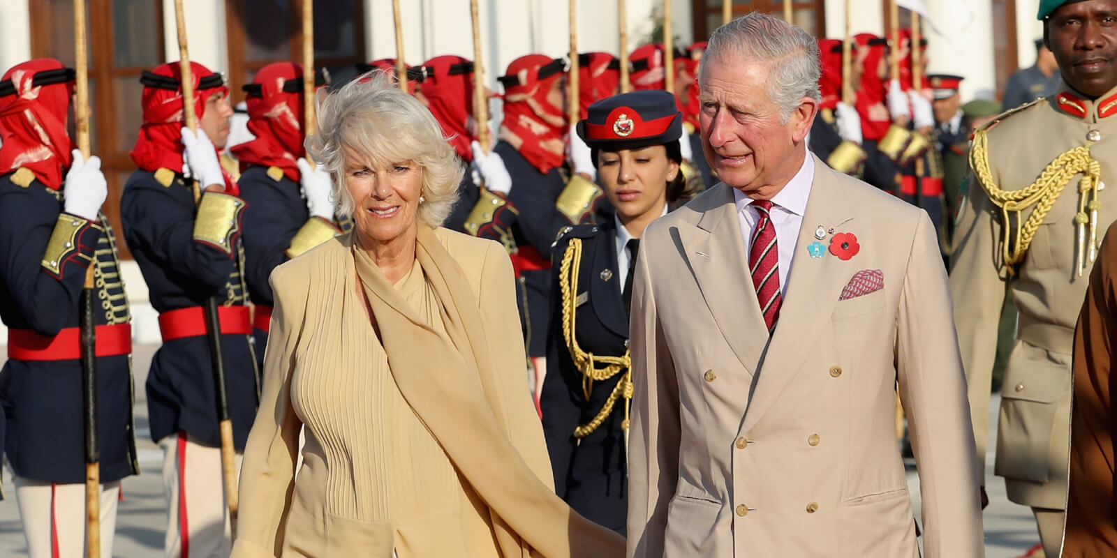 Camilla Parker Bowles and King Charles III head to the Royal plane on day 4 of a Royal tour of Bahrain on November 11, 2016 in Manama, Bahrain.