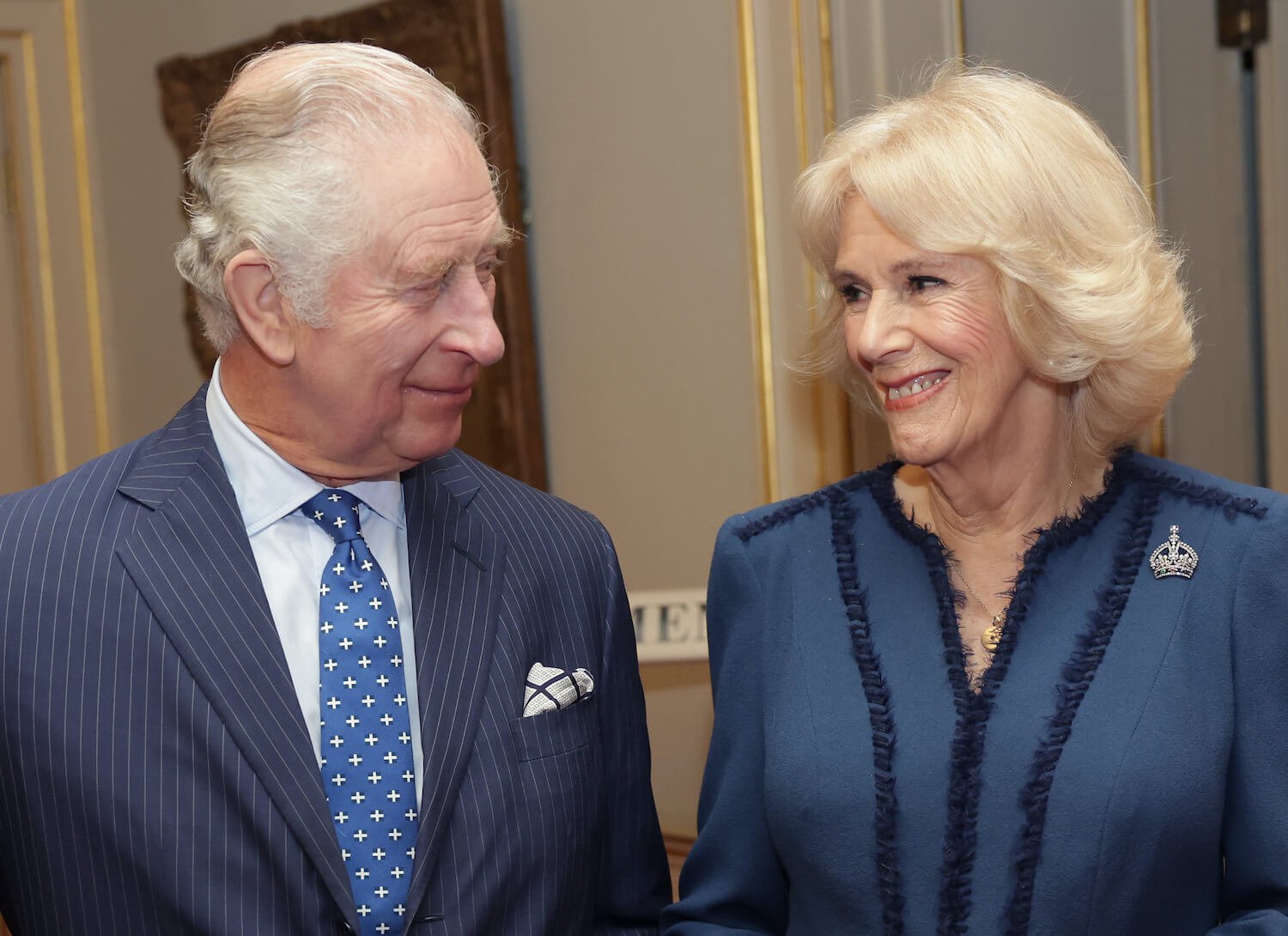 Camilla Parker Bowles body language is supportive around King Charles