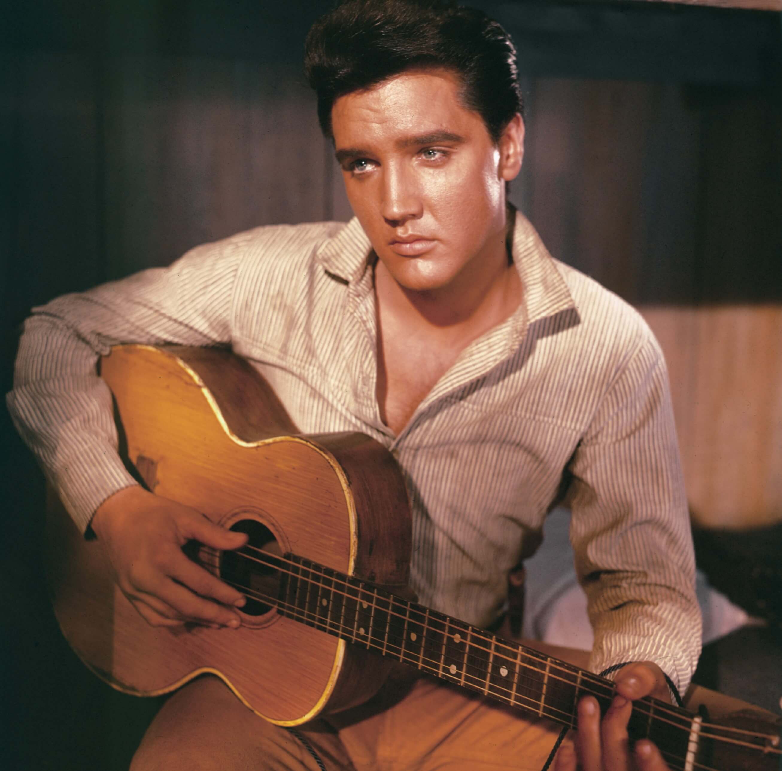 Elvis Presley with a guitar