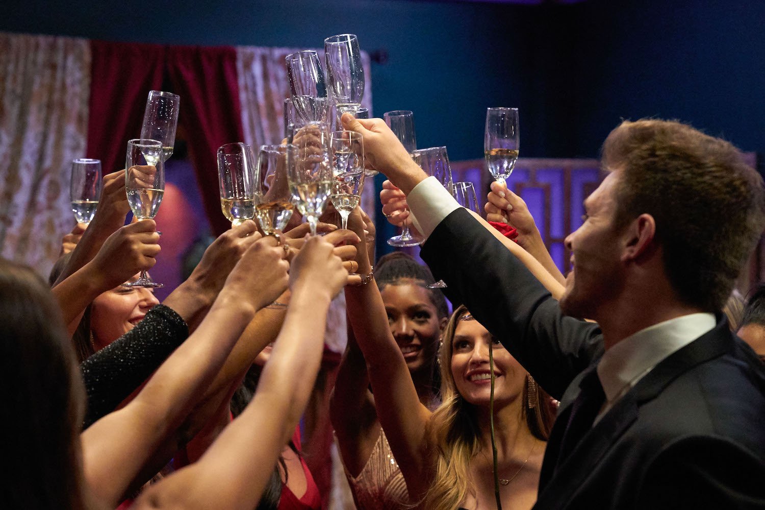 'The Bachelor' cast toasts after a rose ceremony. Is 'The Bachelor' on tonight?