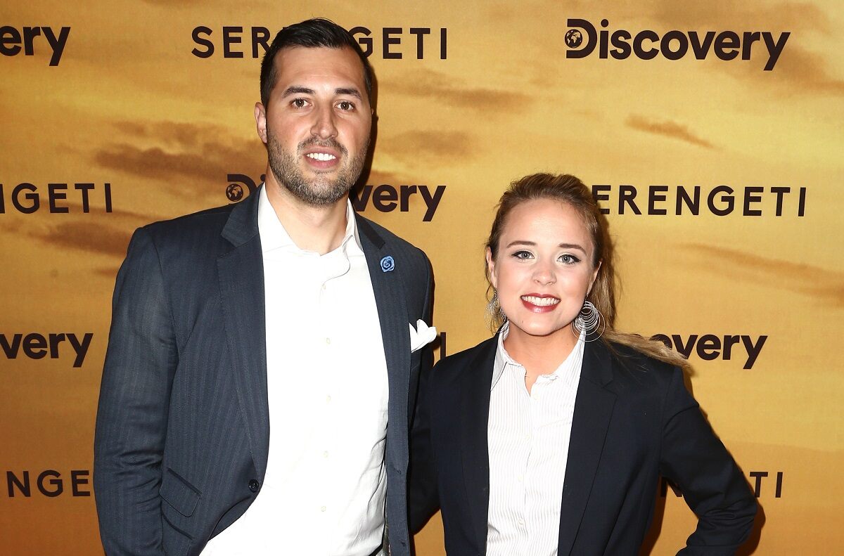Jeremy Vuolo and Jinger Vuolo, wearing suit jackets and white shirts, appear at the 'Serengeti' premiere in 2019