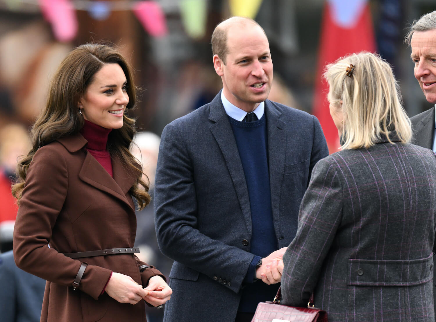 Kate Middleton shows she is similar to Princess Diana when speaking with people, seen here with Prince William