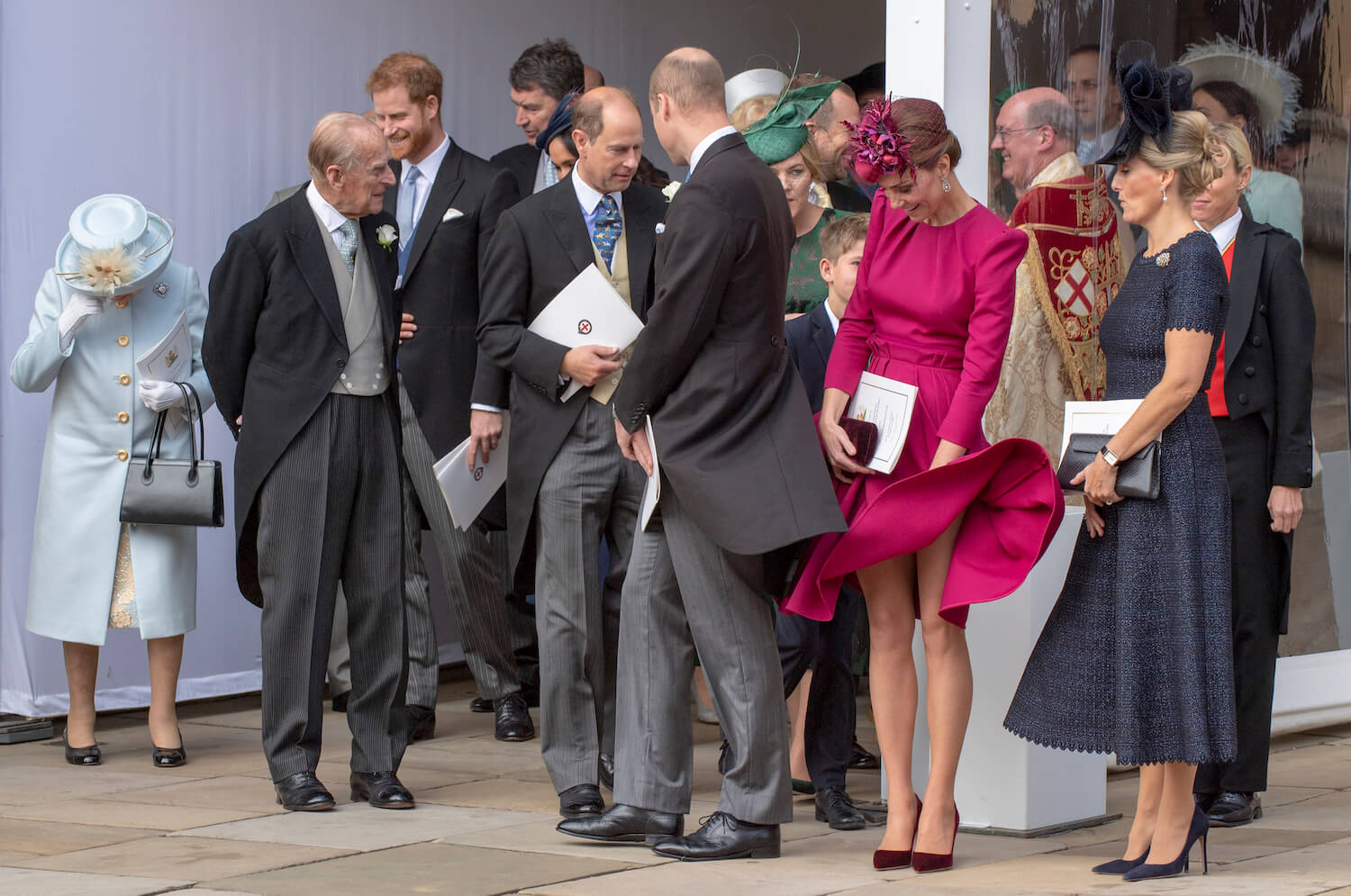 Kate Middleton almost suffers a wardrobe malfunction when her dress blows up in the wind