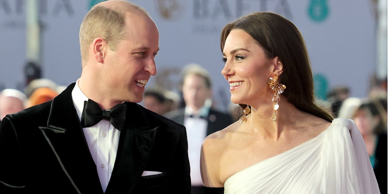 Prince William and Kate Middleton smile at each other at the 2023 BAFTA Awards.