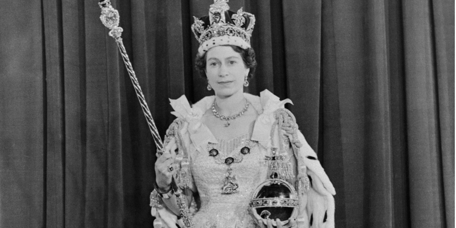 Queen Elizabeth II poses at her coronation in 1952.