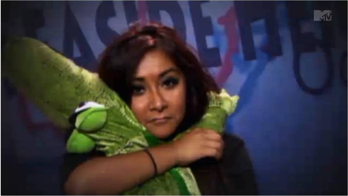 Nicole 'Snooki' Polizzi holding 'Crocodilly,' her stuffed crocodile, in the confessional on 'Jersey Shore'