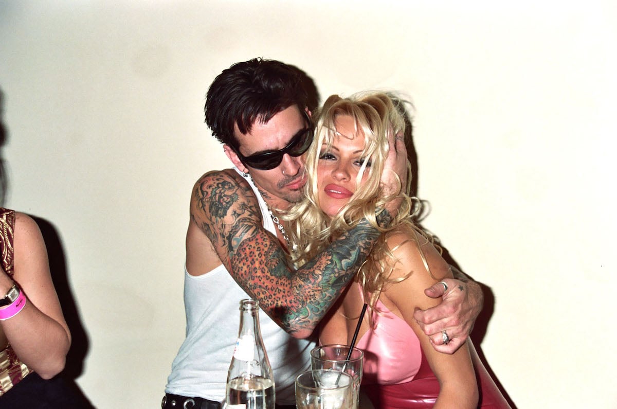 Tommy Lee holds Pamela Anderson close