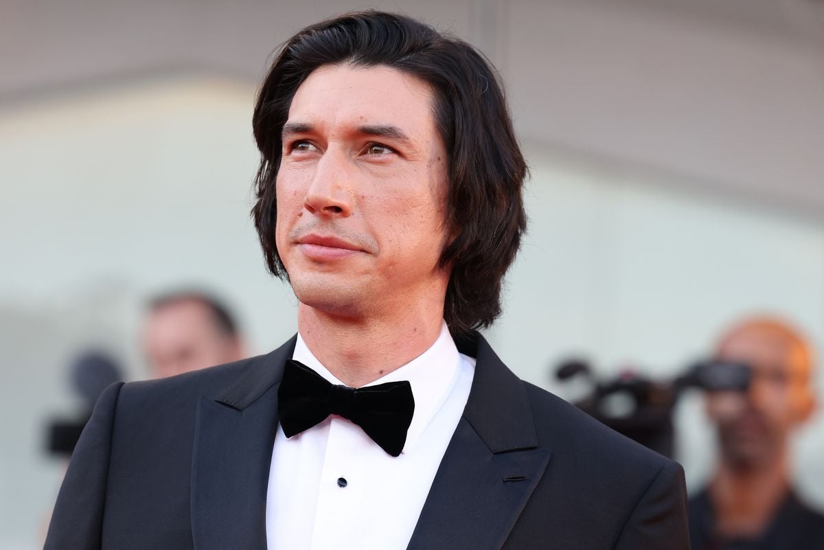Adam Driver poses for a photo at the Venice International Film Festival.