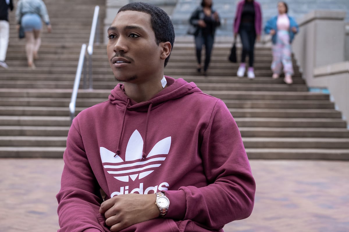 Demetrius 'Meech' Flenory Jr. as Demetrius 'Big Meech' Flenory wearing a cranberry Adidas hoodie in 'BMF'