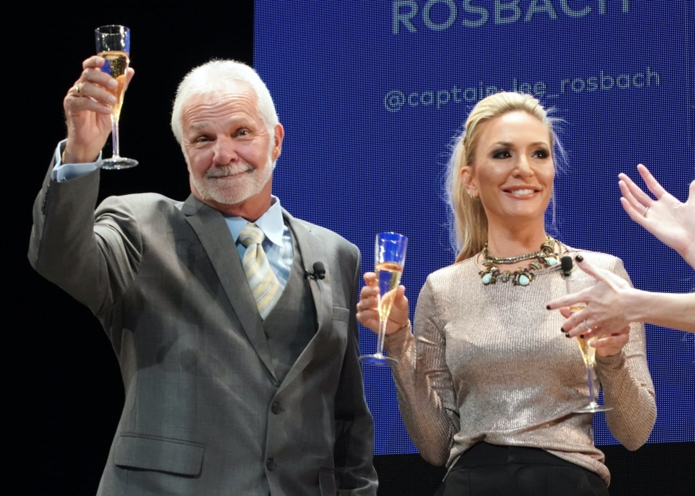 Captain Lee Rosbach and Kate Chastain from 'Below Deck' toast at BravoCon
