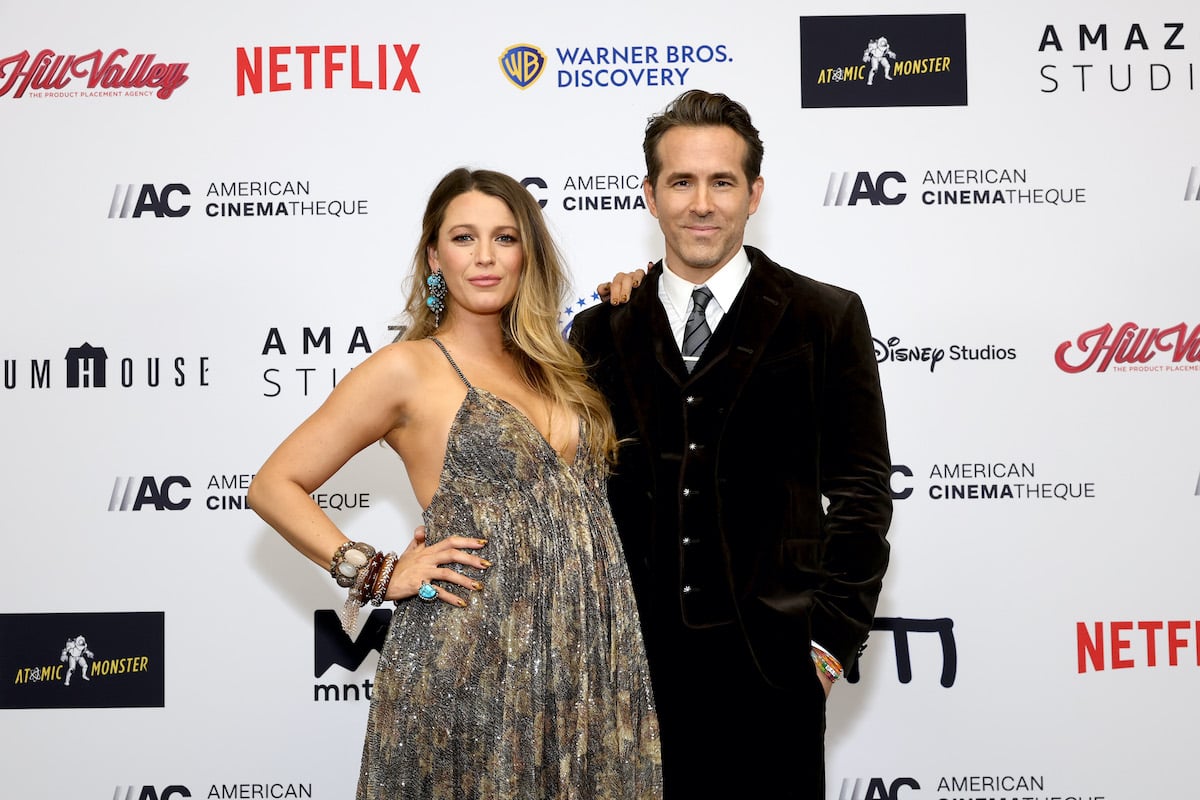 homes owner Blake Lively and Ryan Reynolds pose on the red carpet