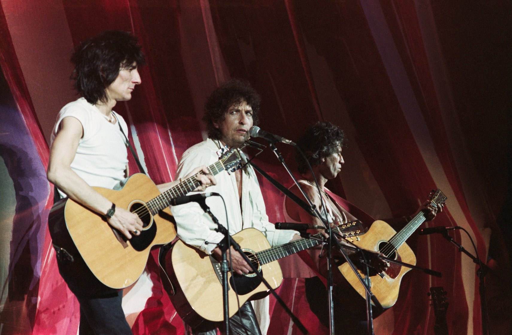 Bob Dylan performs with Rolling Stones members Ronnie Wood and Keith Richards