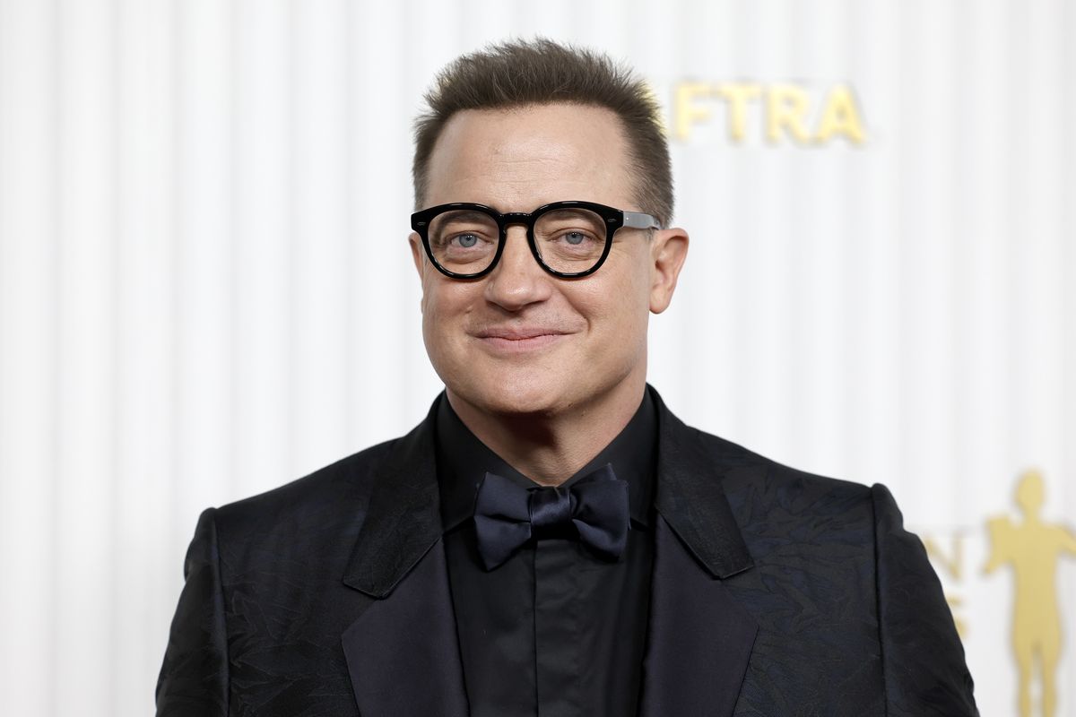 Brendon Fraser smiles on the red carpet for the SAG awards.