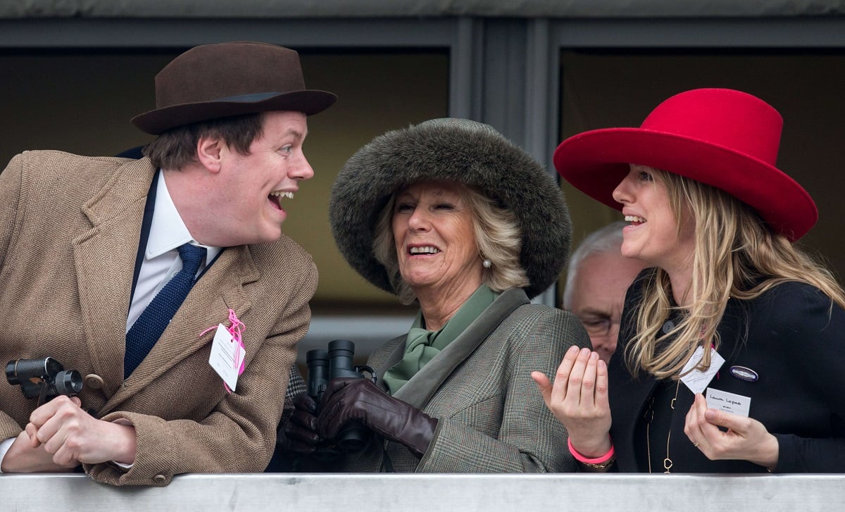 Camilla Parker Bowles watches a race from the Royal Box with her son, Tom Parker Bowles, and daughter, Laura Lopes