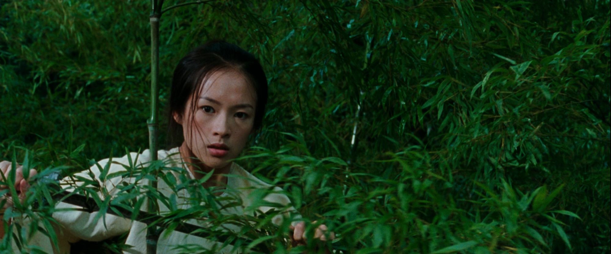 'Crouching Tiger, Hidden Dragon' Ziyi Zhang as Jen hiding behind greenery